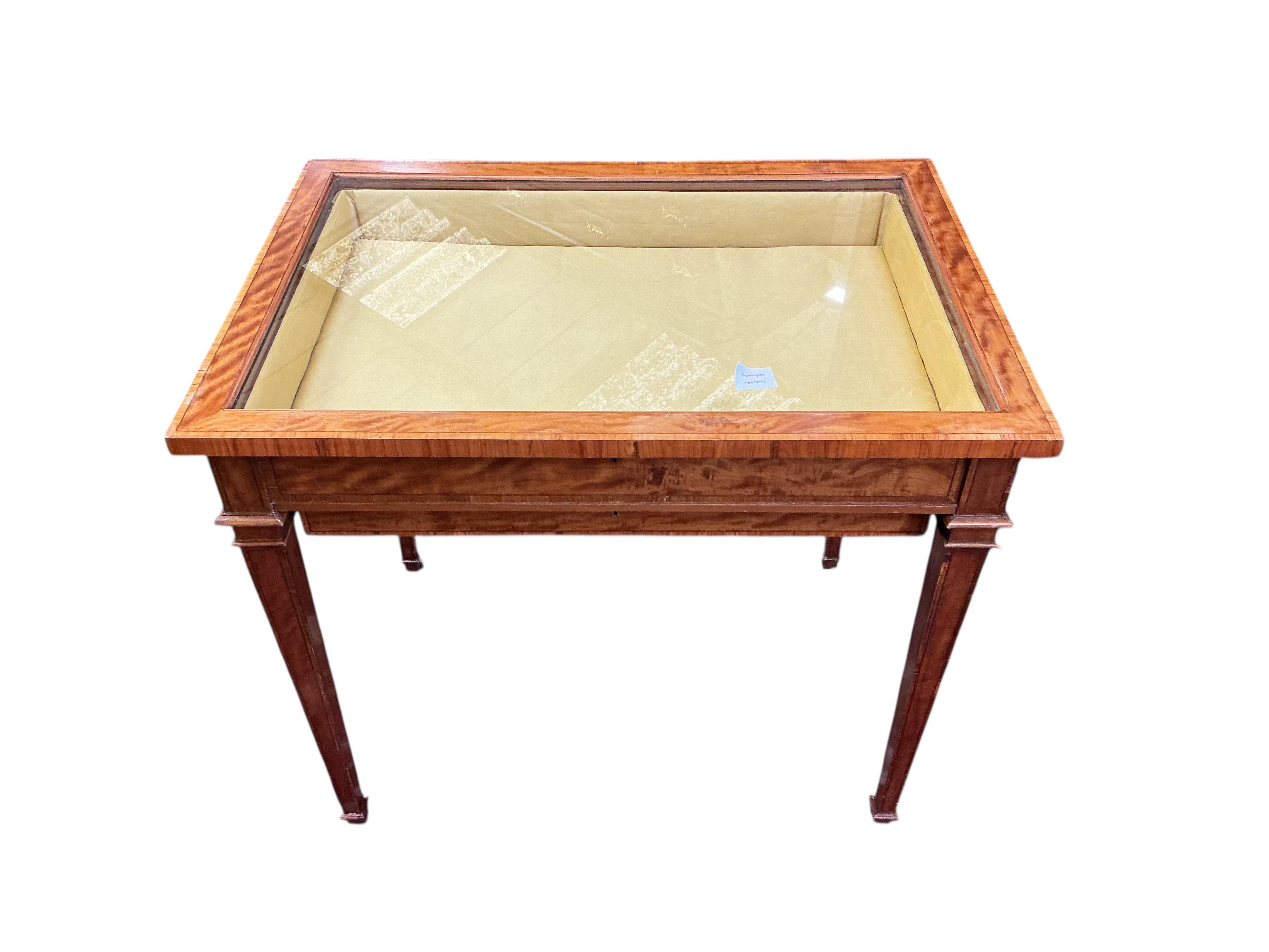 An Edwardian style rectangular satinwood bijouterie table, width 79cm, depth 56cm, height 70cm
